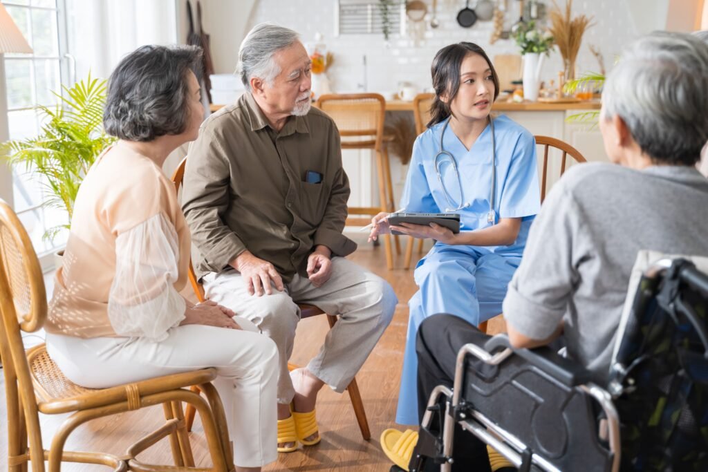 Seniors talking together in a bright room