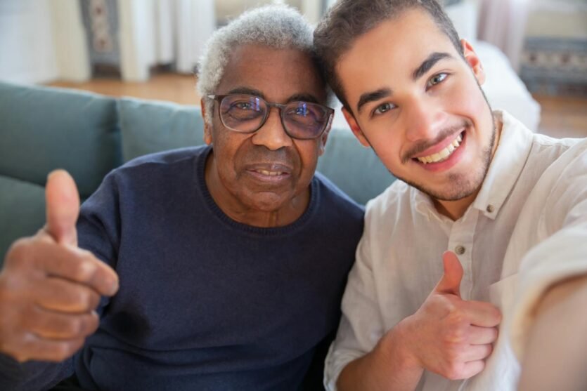 Men Smiling and Doing Thumbs Up